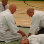 Sensei Walters teaching the details of pinning someone to the floor