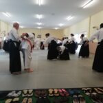 Lots of students testing each others' stability in various positions