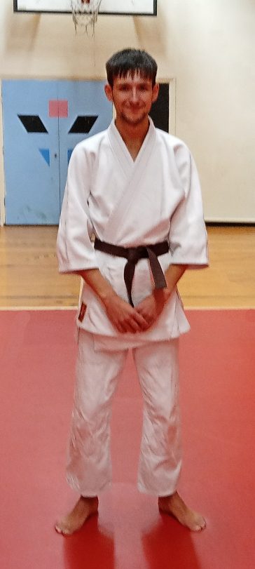 Morgan Hobson, age 22, celebrates the recent gradings