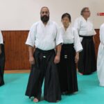 Testing for a relaxed, aligned, and centred state whilst standing.