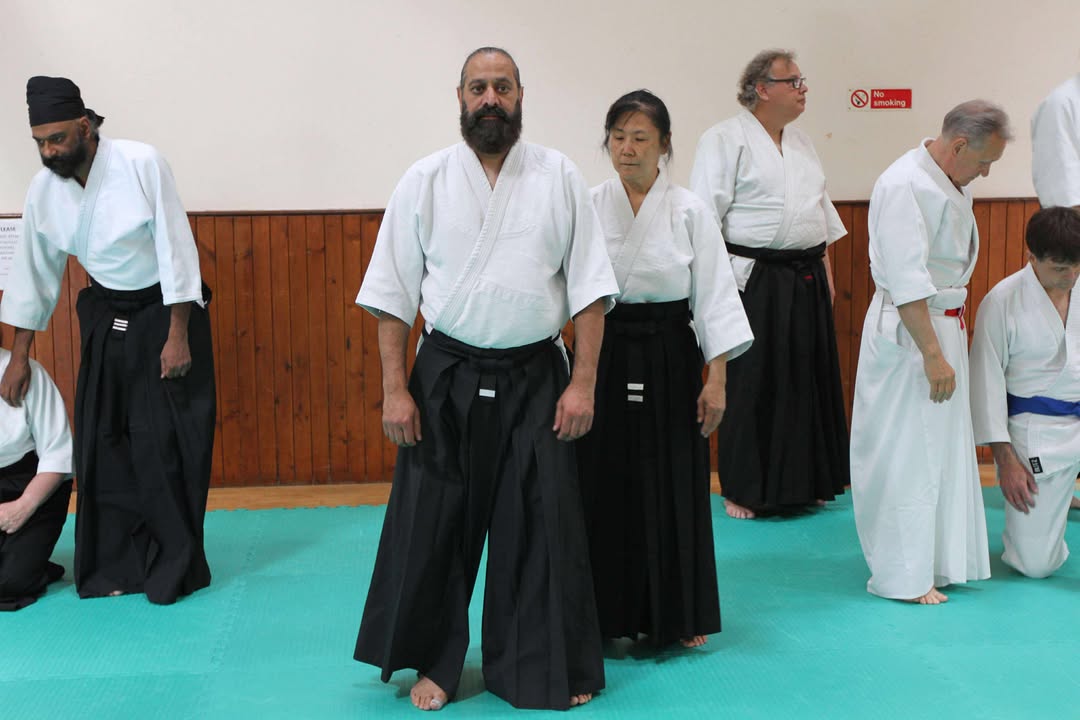 Testing for a relaxed, aligned, and centred state whilst standing.
